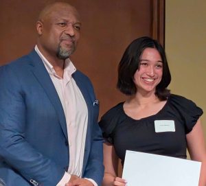Ari Maurer (awardee) receiving the Hilldale Undergraduate Research Scholarship, pictured with Provost Charles Isbell.